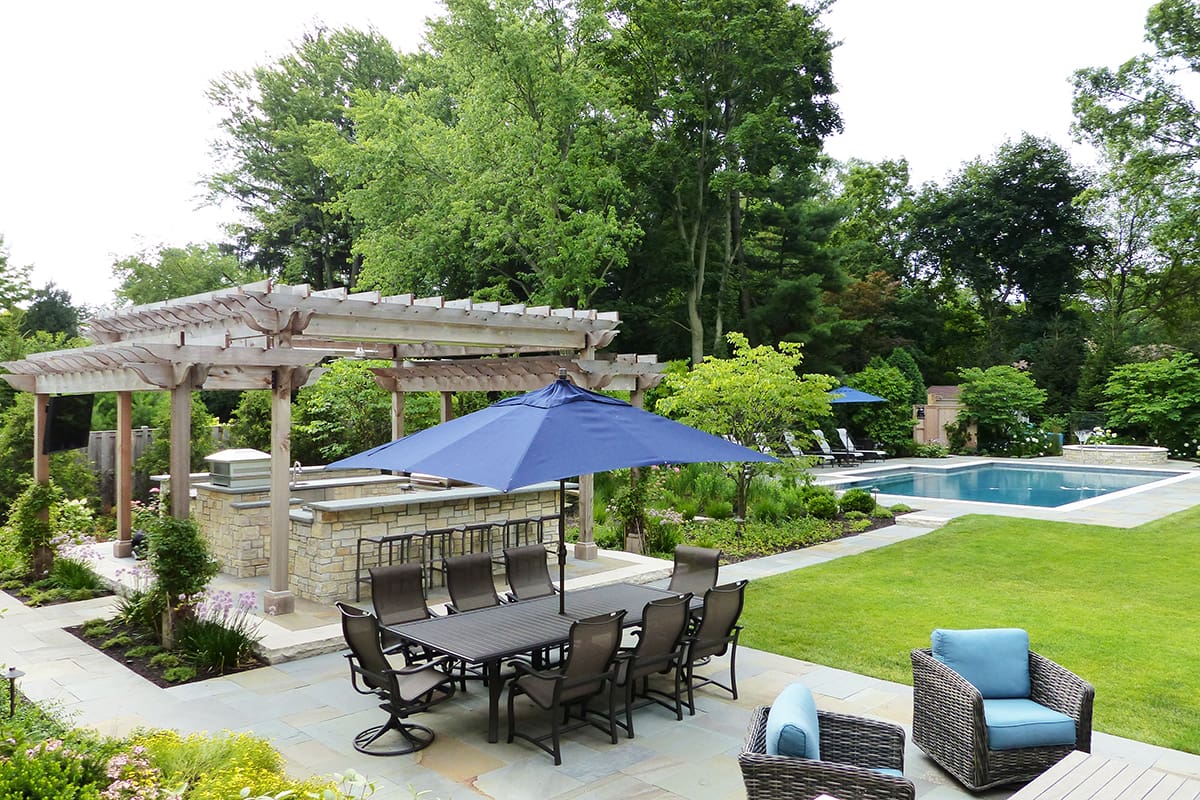 bluestone patio with outdoor kitchen