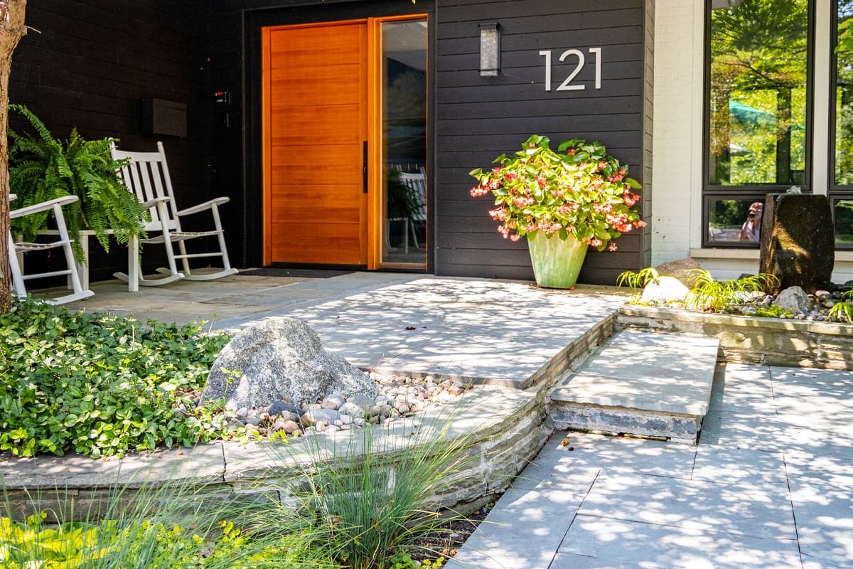 modern entry with oversized large house numbers